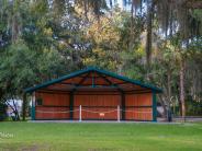Wooden structure over ground level stage at Kings Bay Park 