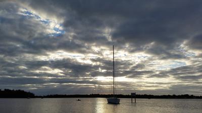 silhouette of sailboat on the water 